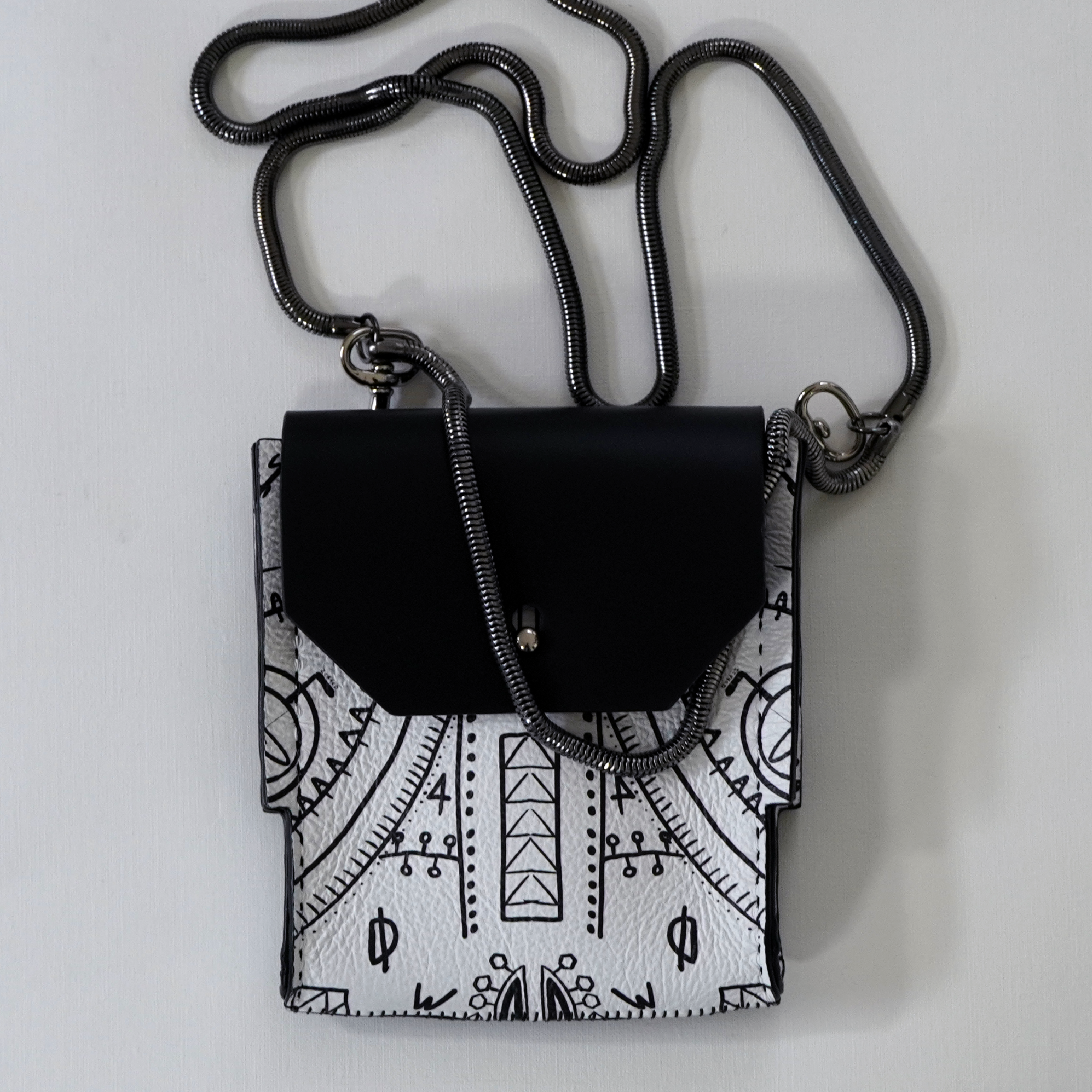 Inverted Monograph Square Leather Pouch