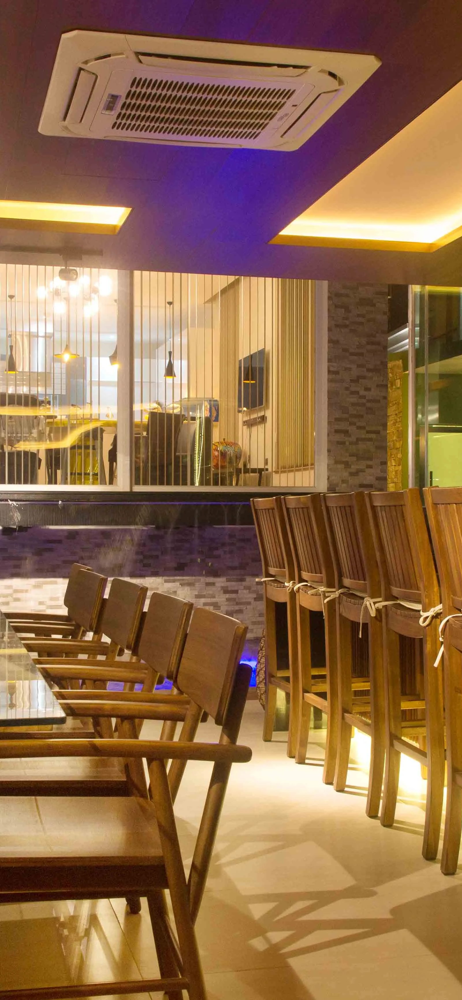 Wooden chairs, purple ceiling by Jorge Rangel Interiors, design — industrial