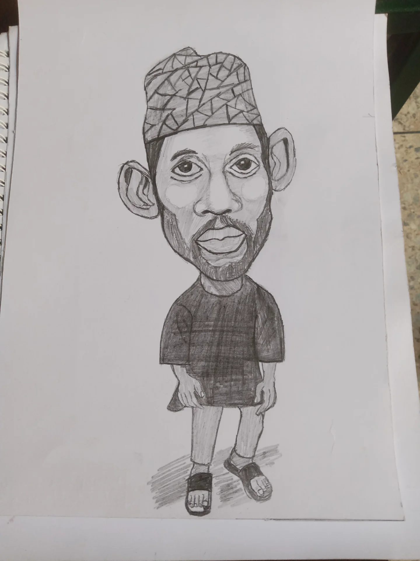 Self caricature.pencil sketch by Abdulwahab Kadiri Ewela , i specialize in painting and drawing....also i do ceramics